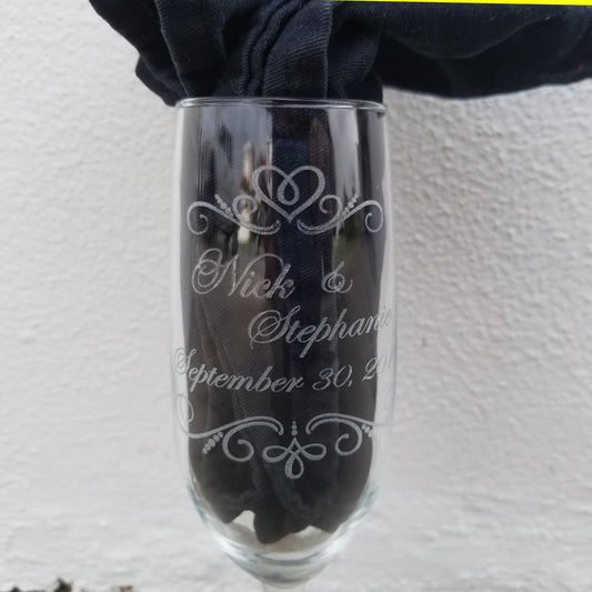 Champagne toasting glass engraved with names and date